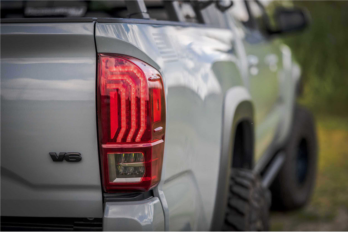 Morimoto LF703. TOYOTA TACOMA (16-23): MORIMOTO XB LED TAILS(Red Lens)